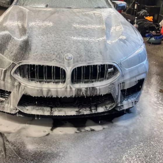 BMW M8 front covered in foam
